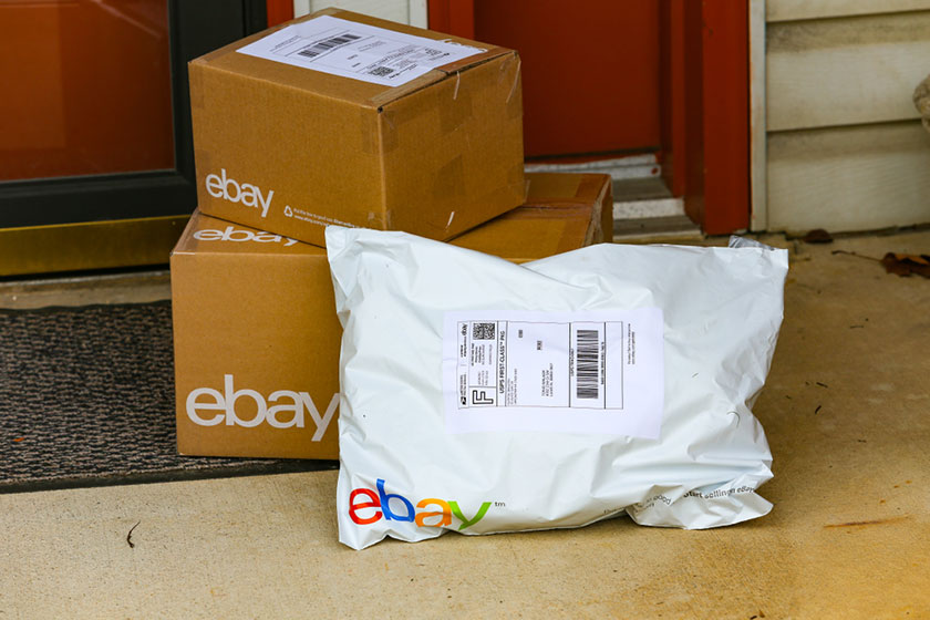 selling products on eBay packages on front door
