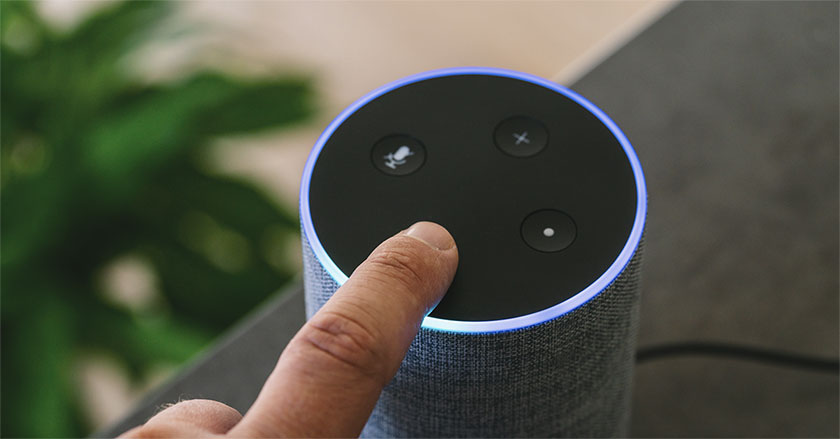 Digital Assistants Are Changing the Way We Buy and Sell pressing button on speaker